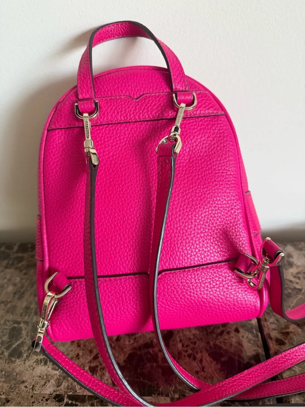 kate spade Bright Pink Pebbled Leather Mini Backpack